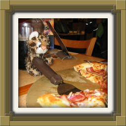 Junior serving pizza