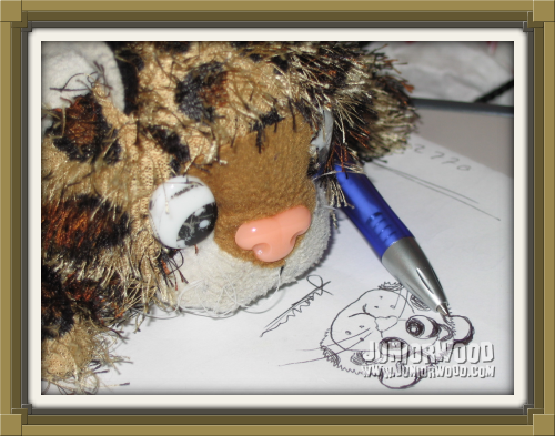 Junior drawing himself with a ballpoint pen.