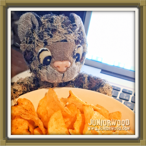 Junior eating spicy crisps